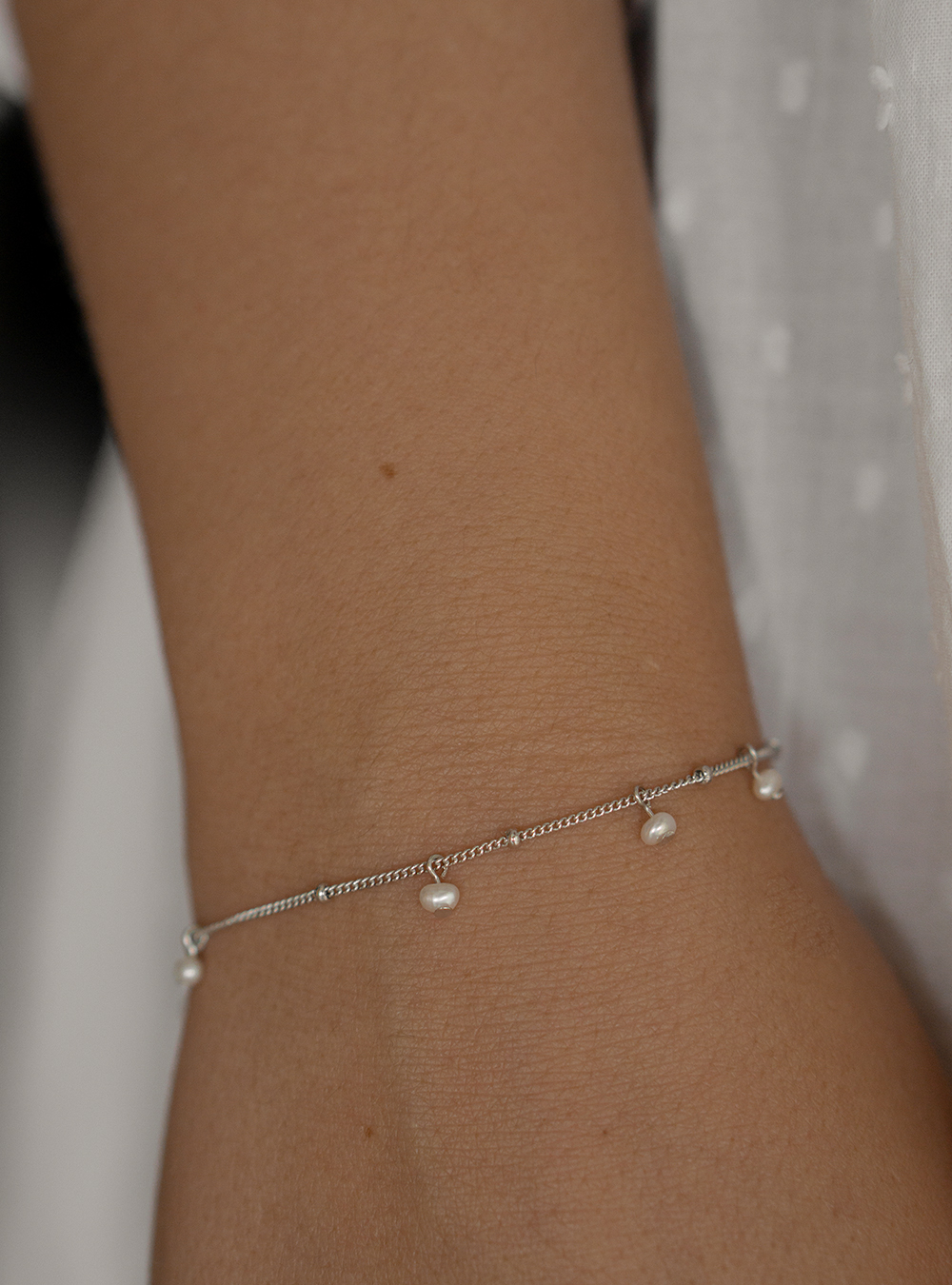 Sølv armbånd med perler